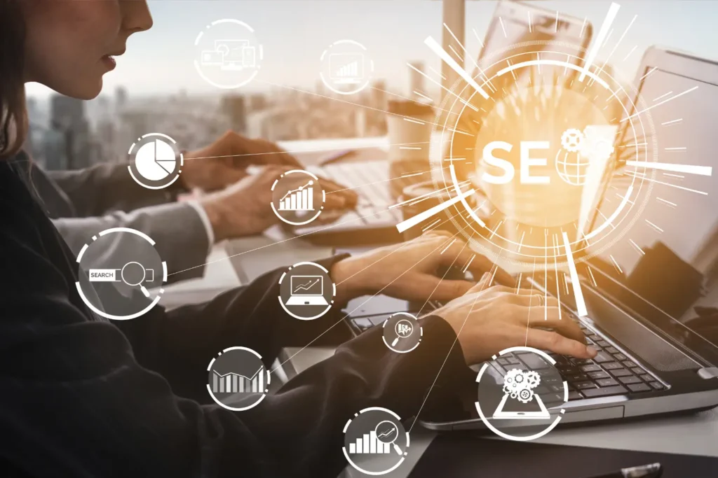 a laptop screen glowing with the words SEO as different icons float around - Digitech
