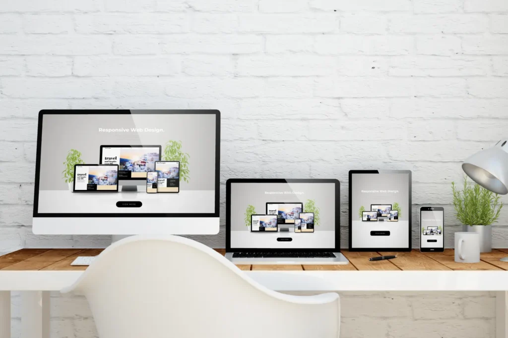 photo of different devices with responsive web site designs on them - Digitech